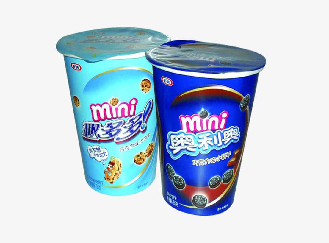 高效封口解決方案——全自動開心零食桶灌裝封口機，助力食品企業(yè)量產(chǎn)升級